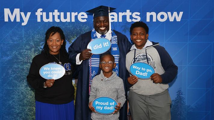 Family of graduating adult student